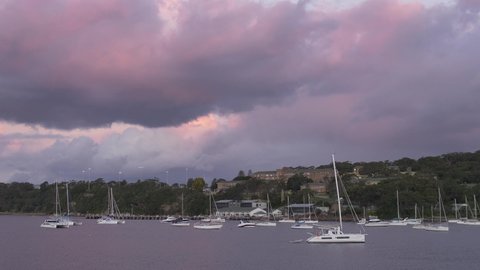 SYDNEY, NSW, AUSTRALIA. JUNE 21 2019. Balmoral boats, and dramatic clouds over Sydney.