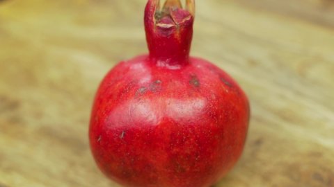 Ripe Pomegranate, Fruit, Close-up. Red Ripe Pomegranate, Spinning, Isolated. Healthy Vitamin Vegetarian Food Background.