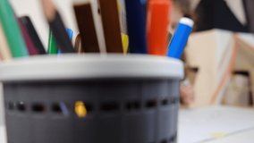 Selective focus of cute kid girl artist playing alone drawing coloring picture with felt pen sit at table, school child enjoying creative art hobby activity at home. Children development concept - Powered by Shutterstock - Get 15% off with code: PIKWIZARD15