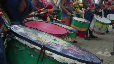 salvador, bahia, brazil - november 21, 2021: percussionists from the afro commanches block are seen during Salvador's carnival approving rally.