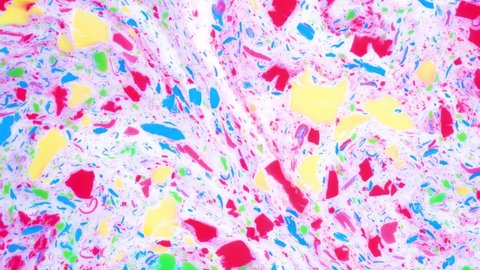 Colorful abstract background, moving spots of paint on the liquid surface. Motley backdrop for VJ and motion design.