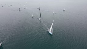 Aerial shot. Slow Motion video of sailing boats on a race