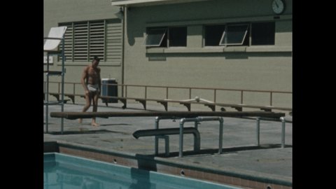 1950s: Doctor examines boy's foot. Hand holds shooting slate. Young man walks to pool and bounces on diving board. Man dives into pool. Women sunbathe.