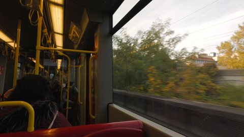 VIENNA  AUSTRIA - NOV 2021: People and commuters traveling on subway train in Vienna, Austria, Europe. Austrian travelers commuting on public underground metro transportation in Wien