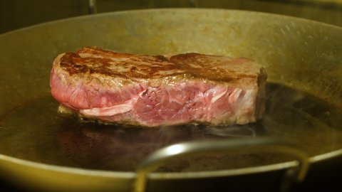 Delicious rump steak prepared in a pan at home