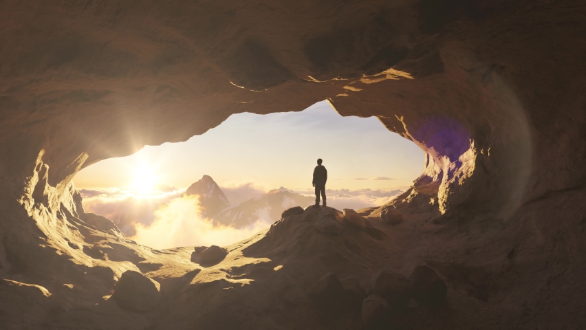 Adventurous Man Hiker standing in a cave with rocky mountains in background. Adventure Composite. 3d Rendering Peak. Aerial Image of landscape from British Columbia, Canada. Sunset Cloudy Sky