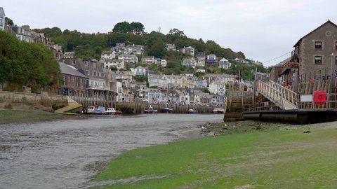 View from a slipway looking toward the historic harbour town of Looe in Cornwall, England, UK