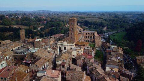 Drone shot around the bell tower of the cathedral in Sutri
