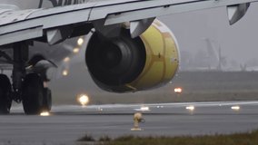 Slow motion close-up video of an airplane turbine on takeoff.