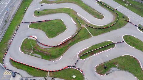 Kart circuit - race track for go cart, motorcycle, bike or radio-controlled model racing. Aerial drone view of the raceway or speedway route with curves.