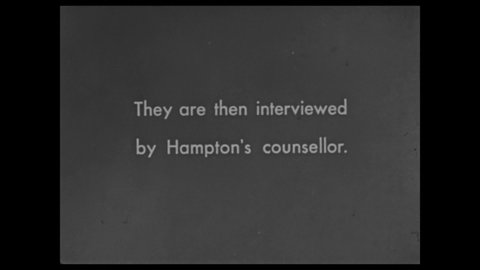 1940s: Caption reads "THEY ARE INTERVIEWED BY HAMPTON'S COUNSELLOR." Young man and woman speak in office. Caption. Men open door and enter office.