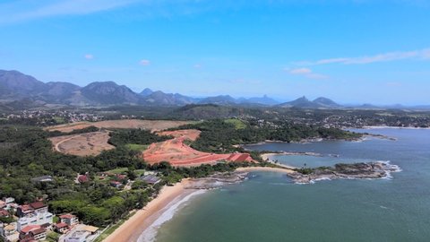 Drone images of the Condominium Condominium Alphaville and the 3 beaches with Praia dos Adventistas. A sunny morning on Espírito Santo beach.