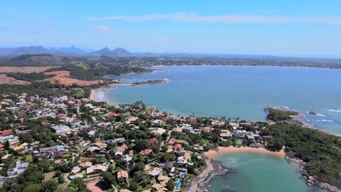 Drone image in a sunny morning at Condominio Aldeia da Praia with Praia da Cerca in the background in Guarapari in the state of Espírito Santo Brazil.