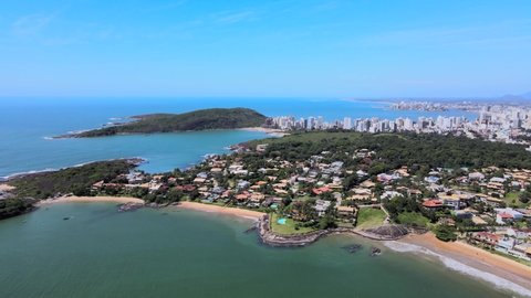 Drone image in a sunny morning at Condominio Aldeia da Praia with Praia da Cerca in the background in Guarapari in the state of Espírito Santo Brazil.