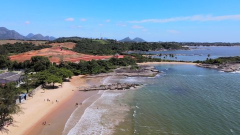 Drone images of the Condominium Condominium Alphaville and the 3 beaches with Praia dos Adventistas. A sunny morning on Espírito Santo beach.