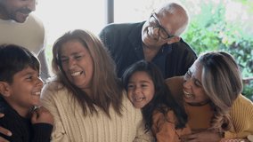 Cute little latin girl hugging grandmother after lunch at home on patio - Family love  - Powered by Shutterstock - Get 15% off with code: PIKWIZARD15
