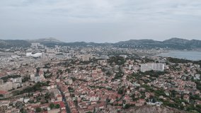 Establishing Aerial View Shot of Marseille Fr, Bouches-du-Rhone, Provence-Alpes-Cote d'Azur, France, overcast, wide view