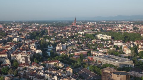 Establishing Aerial View Shot of Strasbourg Fr, capital of European Union, Bas-Rhin, France, Notre Dame de Strasbourg in the middle of the city
