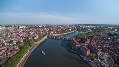 Establishing Aerial View Shot of Toulouse Fr, Haute-Garonne, France, river Garonne Quai de la Daurade and Basilica of Our Lady of the Daurade