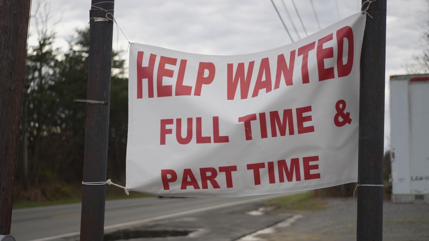 Help Wanted sign hanging by side of a rural West Virginia road in autumn. | Shutterstock HD Video #1082977117