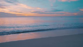 Sunset beach copy space, ocean, sea horizon tropical island. fantastic natural seascape sunset summer. pararamic beach sea beach sun rise. Landscape color orange sky and clouds.Video footage 4K