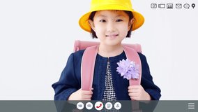 Asian little girl talking with a video calling. Screen interface of a video chat.