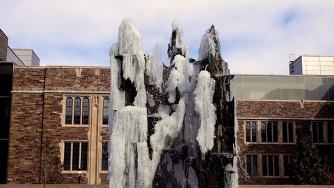 USA, PRINCETON - November 15, 2019:  where water froze and it was covered with ice, Princeton Fountain
