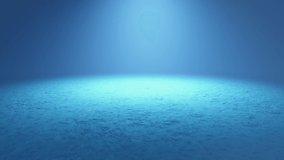 Abstract background with underwater scenic nature with sunlights. Deep of sea in slow footage in blue color with copy spaces in 4K Ultra HD.