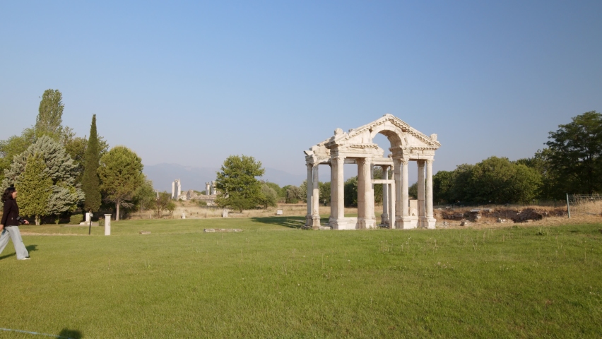 woman walking in ancient city, in Aphrodisias, Aydın, Turkey