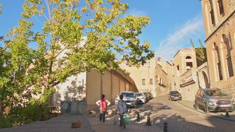 Mardin - 25th september, 2021: boy and girl kids go to school in mardins neighborhood in sunny morning