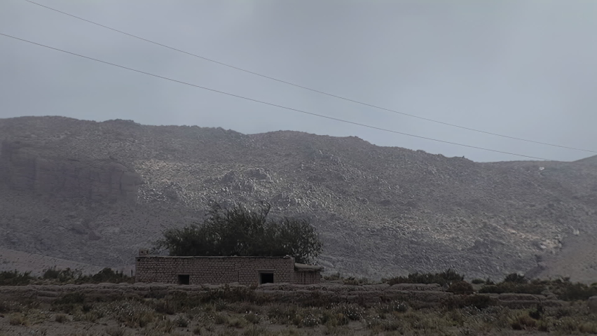 An Abandoned Adobe House Against a Hill in Las Cuevas, Catamarca Province, Argentina.  