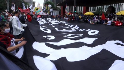 Sao Paulo , Brazil - 11 19 2021: protest against Brazilian president Bolsonaro. Black conscience day, Fora Bolsonaro, in Paulista avenue