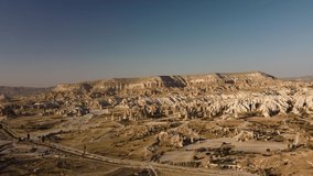 Drone flying above Zelve Valley in the sky of Cappadocia with beautiful mountain landscapes, Turkey Goreme