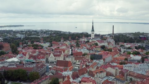 Aerial view Tallinn Estonia. A city on the Baltic Sea with old churches and houses with red roofs. Cityscape with historic architecture.