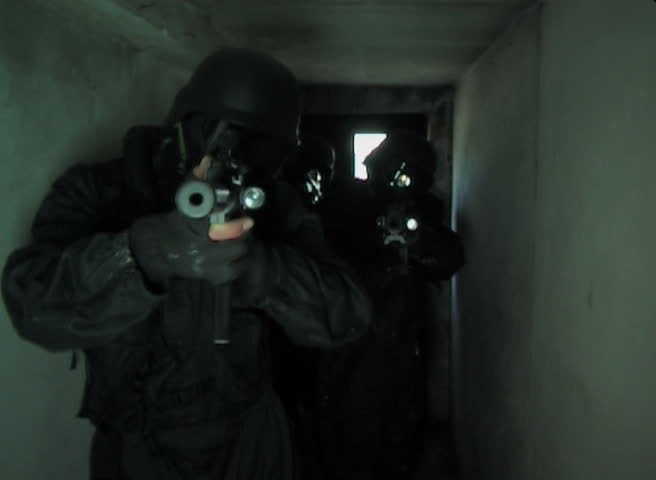 Special Forces running through tunnel