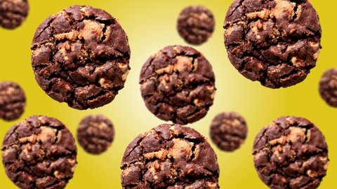 Flying Delicious Chocolate Chip Cookies of different diameters move to the center on trending yellow color gradient background (horizontal, not loopable) in 4K UHD footage.