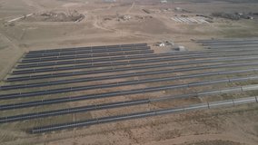 Solar panels at a modern ecological power plant, video from a drone over an alternative power plant.