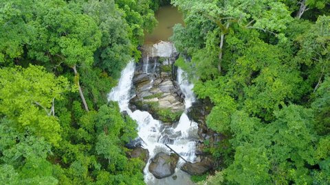 Aerial view of Sirithan waterfall with spray of water Splashing one of the famous waterfall at Doi Inthanon National Park mountain. Located in Chiang Mai, Thailand.