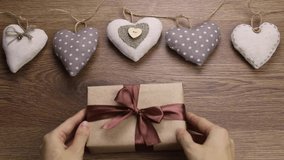 The heart is made of cotton fabric and a gift. valentine's day.The concept of decoration, sewing, needlework. - Powered by Shutterstock - Get 15% off with code: PIKWIZARD15