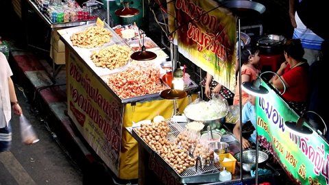 SAMUT PRAKAN, THAILAND, OCT 24 2019, People shopping food from stalls on street at Phra Samut Chedi Temple Fair. 