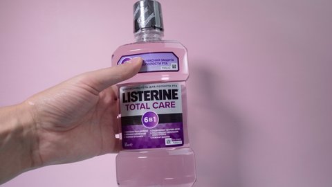 Tyumen, Russia-October 15, 2021: Listerine Total Care 6 in 1 Mouthwash. Logo close-up 4 K.