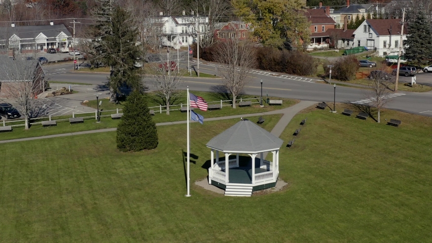 Aerial view of Town Square Park including a flagpole, gazebo, and benches. 