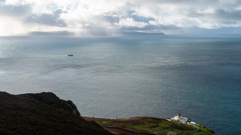 Time Lapse on The Mull of Kintyre with a view of the sea and lighthouse