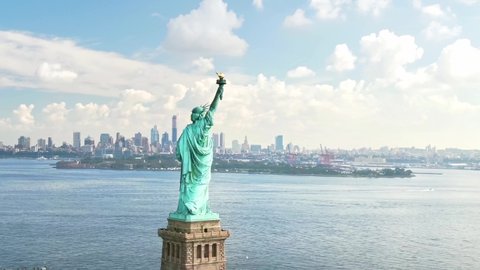 Statue of Liberty, Aerial Manhattan view downtown New York city. Drone NYC. Famous travel destination in America. Historic Liberty island.