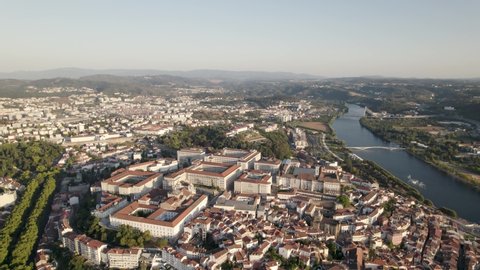 Coimbra cityscape and Mondego River. University historical buildings. Aerial view