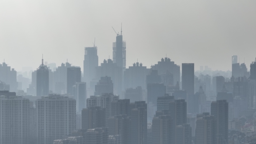 Drone aerial view of Shanghai city skyline skyscrapers in the mist. Travel city life and business concept b-roll footage. Landmarks, buildings and skyscrapers in the background. Quiet and Mysterious | Shutterstock HD Video #1083142318