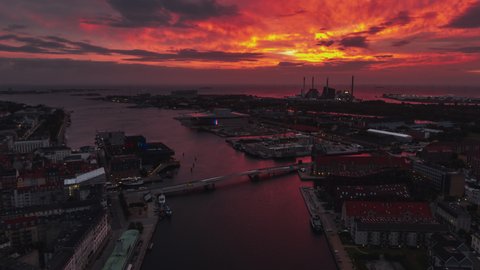 Copenhagen, Denmark - circa 2021 -  Establishing Aerial View Shot of Copenhagen, capital of the North, Denmark, red sunrise over capirtal