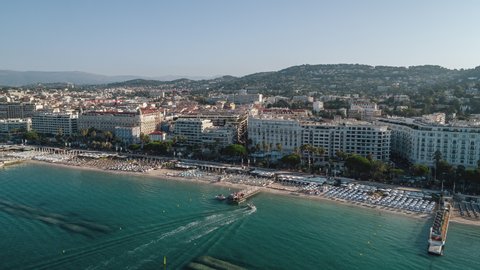 Cannes, France - circa 2021 - Establishing Aerial View Shot of Cannes French Riviera Fr, French Riviera, Alpes-Maritimes, France, city getting ready for the day