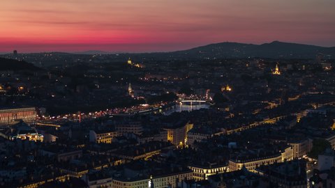 Mesmerizing Sunset over city, Establishing Aerial View Shot of Lyon Fr,  Auvergne-Rhone-Alpes, France, 