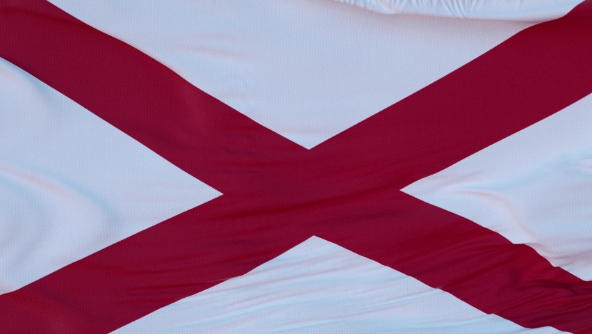 Flag of Alabama state, region of the United States, waving at wind